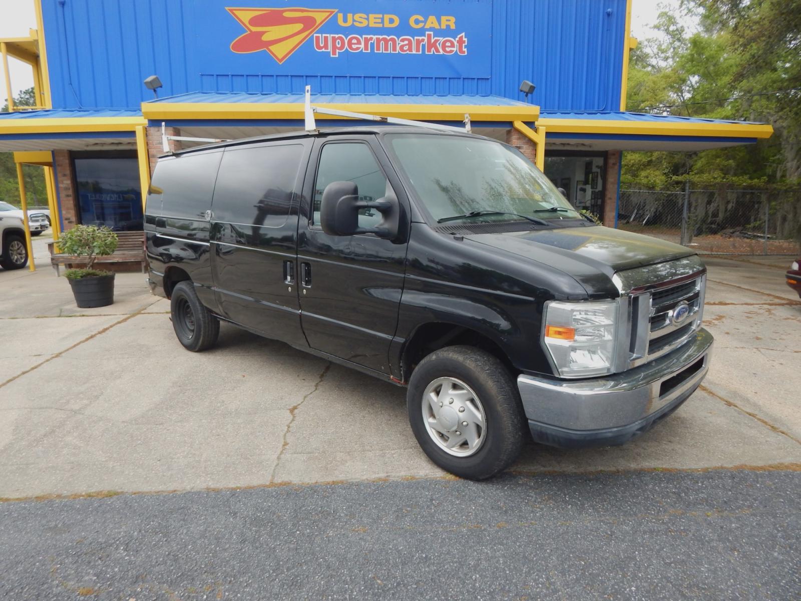 2014 Black Ford E-Series Van (1FTNE1EW6ED) with an V8 engine, Automatic transmission, located at 3120 W Tennessee St, Tallahassee, FL, 32304-1002, (850) 575-6702, 30.458841, -84.349648 - Used Car Supermarket is proud to present you with this loaded immaculate 2014 Ford E150 Econoline Work Van. Used Car Supermarket prides itself in offering you the finest pre-owned vehicle in Tallahassee. Used Car Supermarket has been locally family owned and operated for over 48 years. Our E150 Work - Photo #1